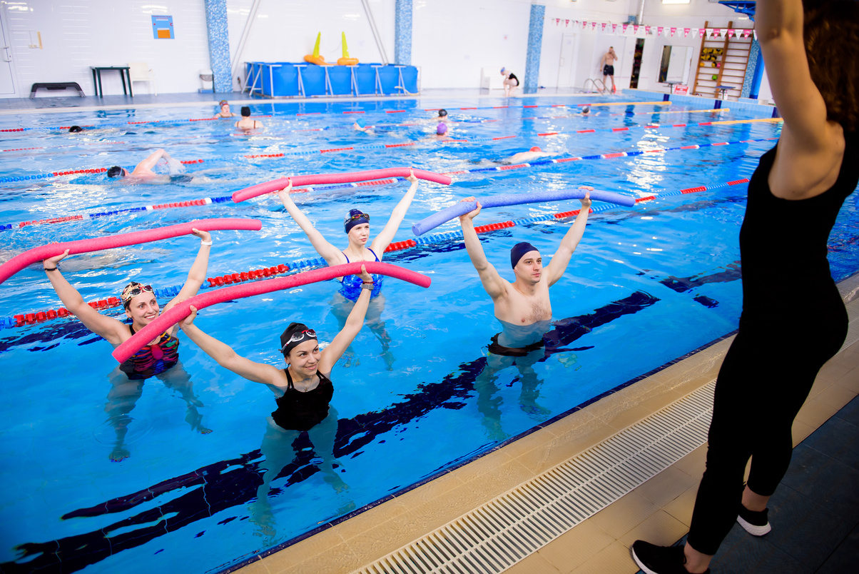 Aqua aerobics training in the water sports center.